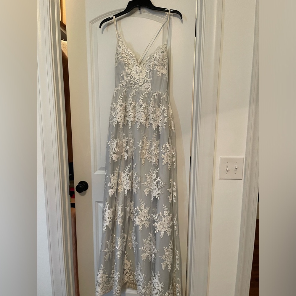 Say yes to the prom. Blue and white lace prom dress